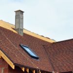 men working on roof